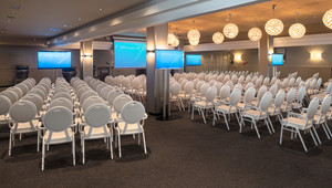 Event room in theater setup with extra TV screens