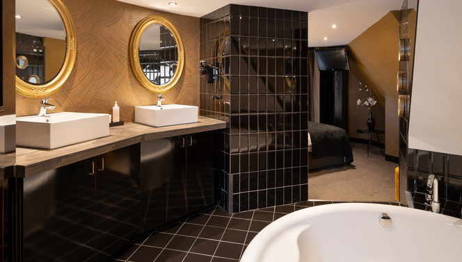 sink with gold mirrors